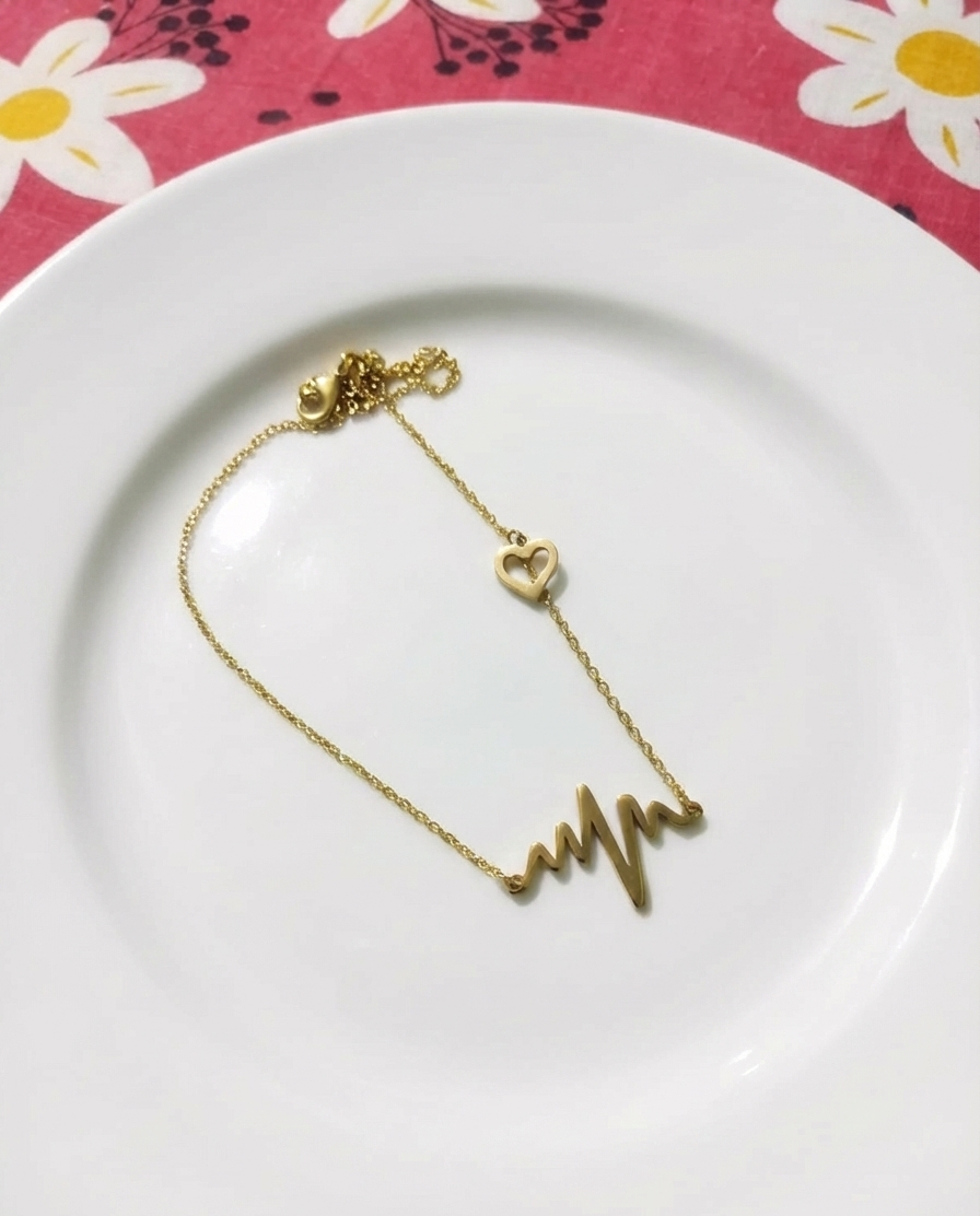 GL: Gold Heartbeat Charm Bracelet for Women