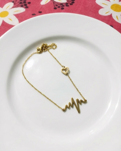 GL: Gold Heartbeat Charm Bracelet for Women